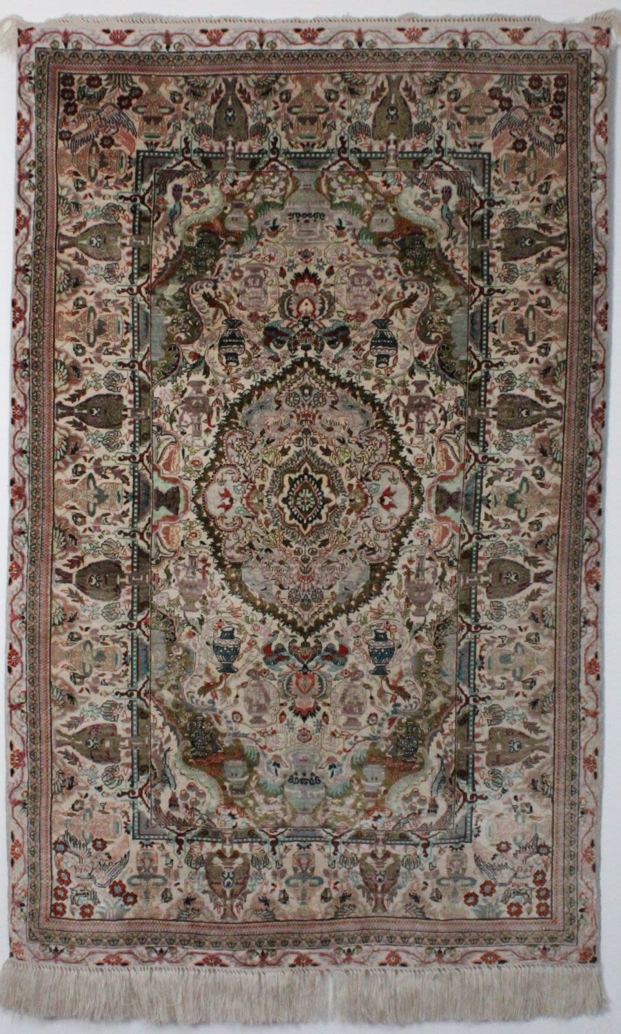 Lot 239: An exquisite silk carpet, crafted with utmost precision...