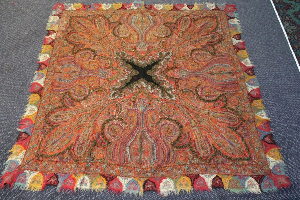 Lot 242: 19th Century Kashmiri Table Rug: This exquisite 19th-century...