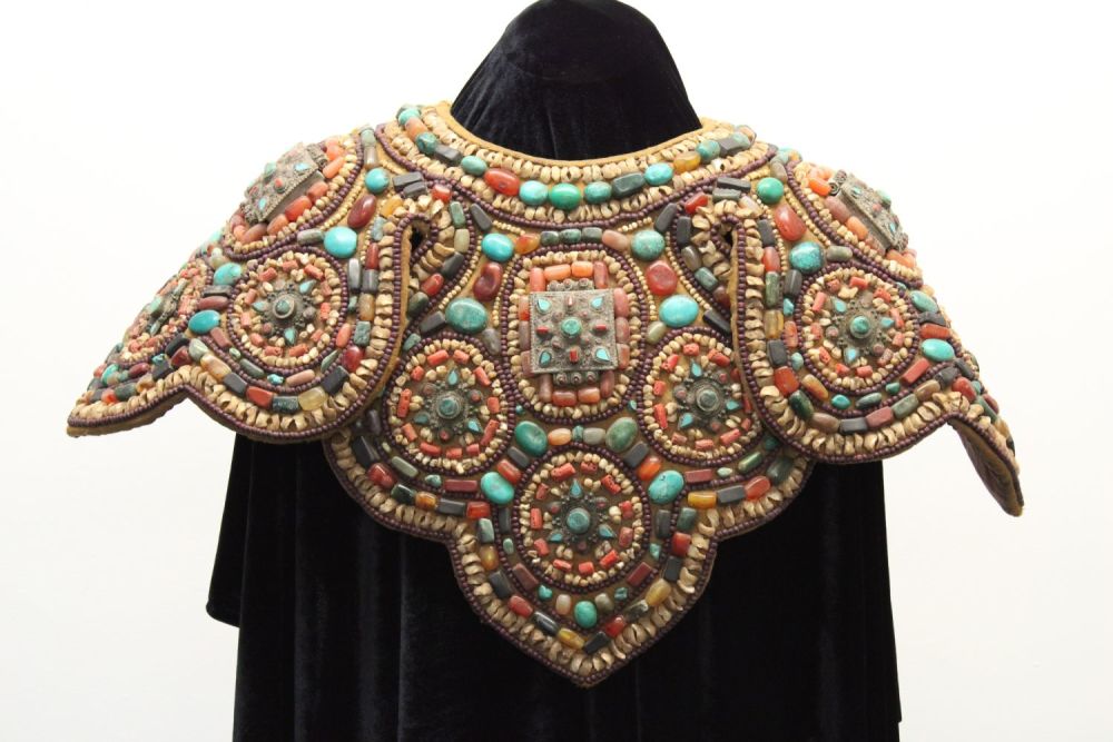 Lot 246: Tibetan Tribal Splendor: Coat & Bracelets Adorned with...