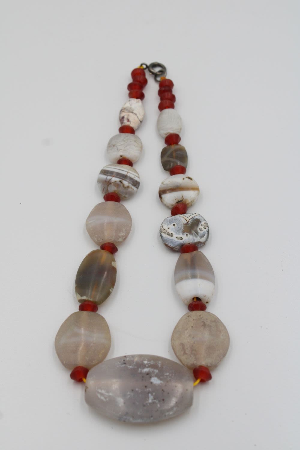 Lot 283: Ancient White and orange agate necklace with a...