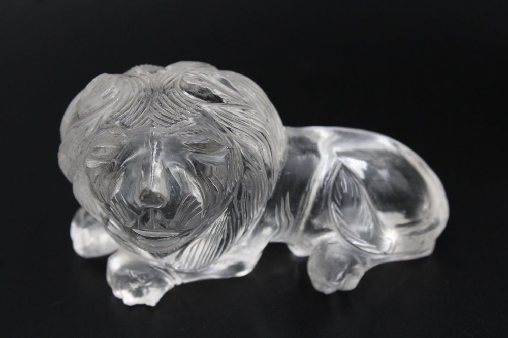 Lot 310: Exquisite crystal or glass lion with intricate carvings,...