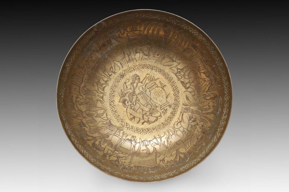 Lot 17: An Islamic Qajar Bowl adorned with intricate Qur'anic...