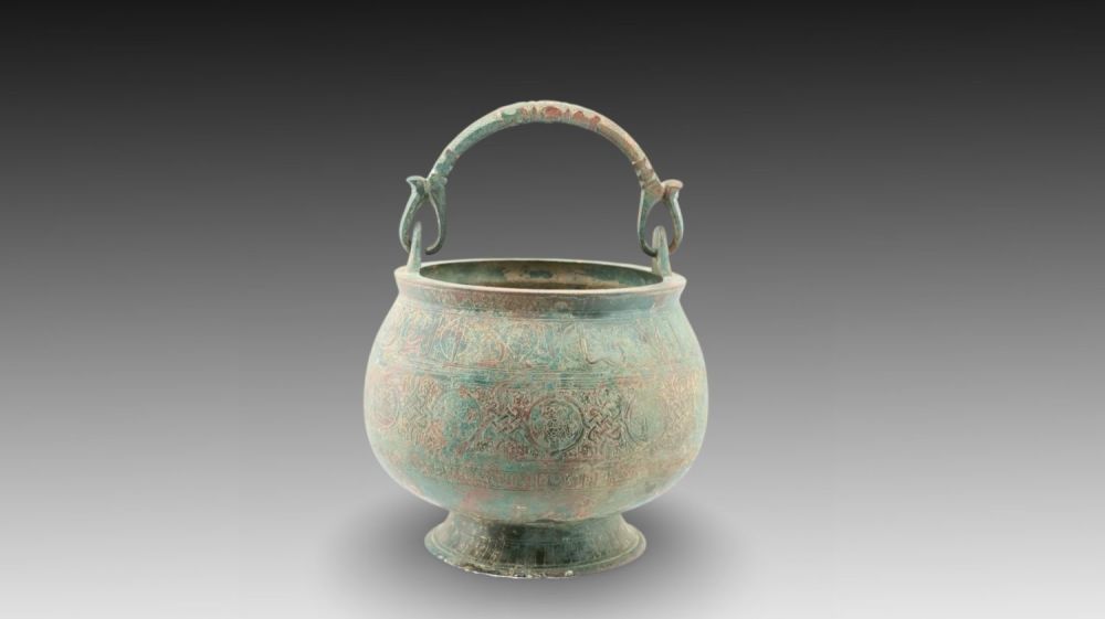 Lot 33: An Islamic Bronze Bucket from the 12th Century...