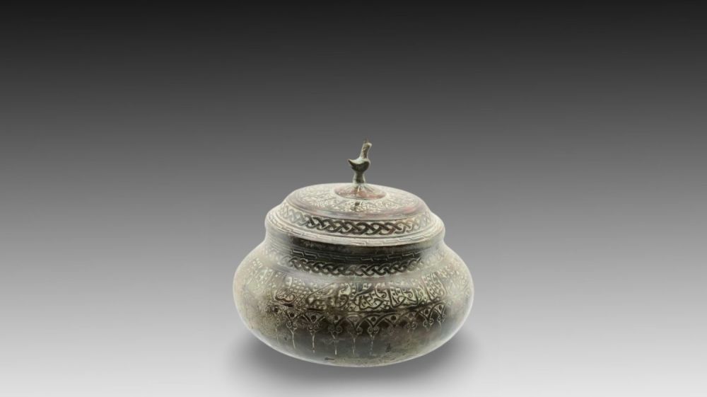 Lot 37: An Islamic Bronze Sugar Pot from Possibly the...