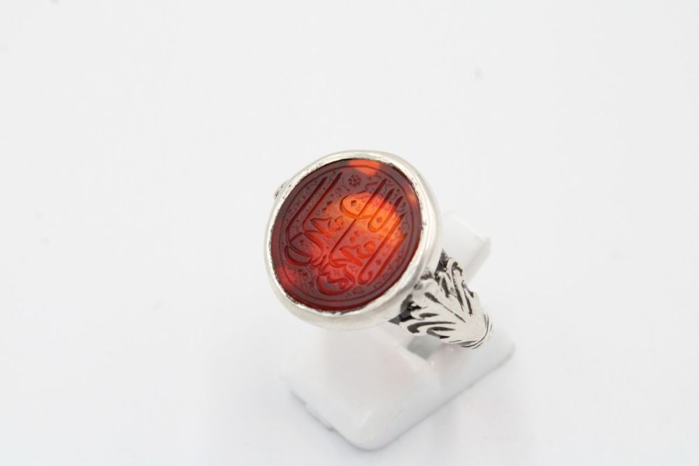 Lot 60: An Islamic Timurid-style Ring with Agate and Islamic...