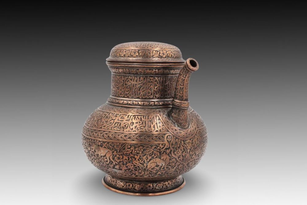 Lot 65: An Islamic Copper Water Jug with Beautiful Islamic...