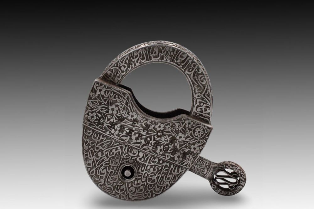 Lot 66: An Islamic Iron Lock with Key with Islamic...