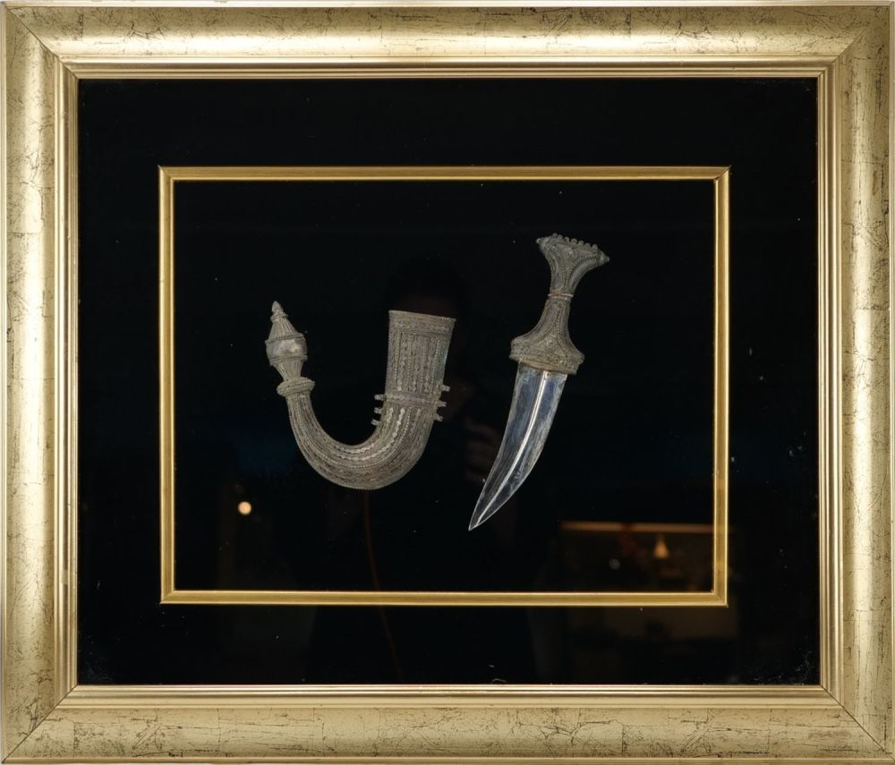 Lot 71: An Islamic White Metal Dagger from Saudi Arabia...