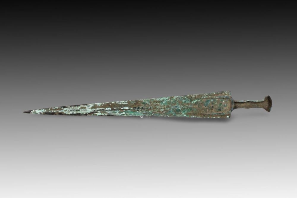 Lot 133: An Ancient Bronze Dagger from Circa 1800-600 BC...