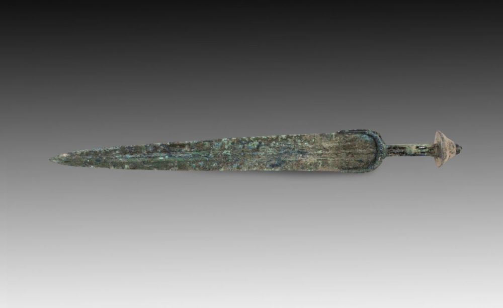 Lot 135: An Ancient Bronze Dagger from Circa 1800-600 BC...