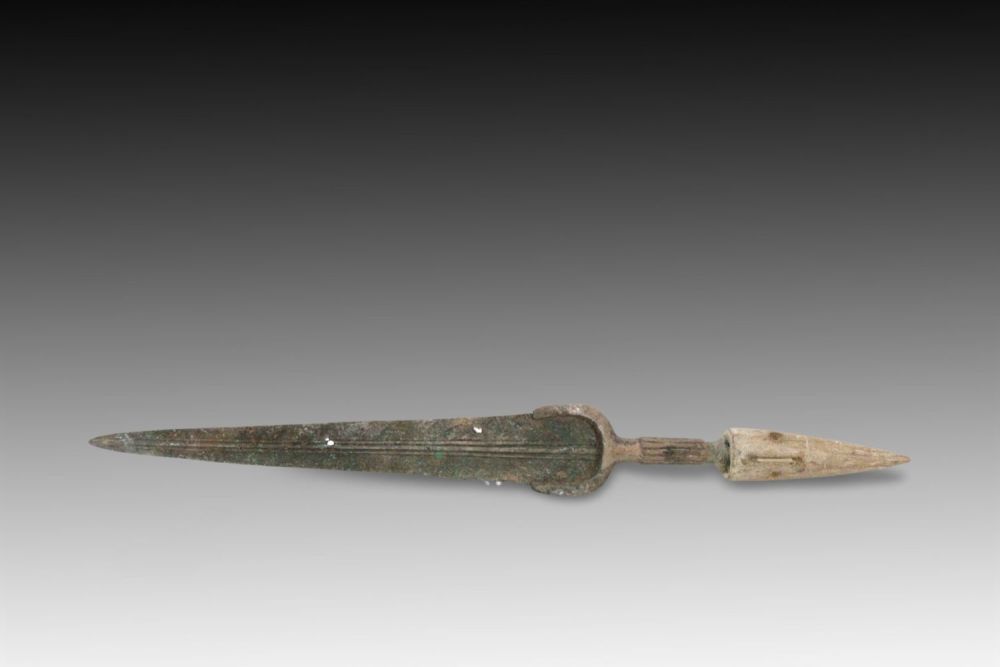 Lot 138: An Ancient Bronze Dagger from Circa 1800-600 BC...