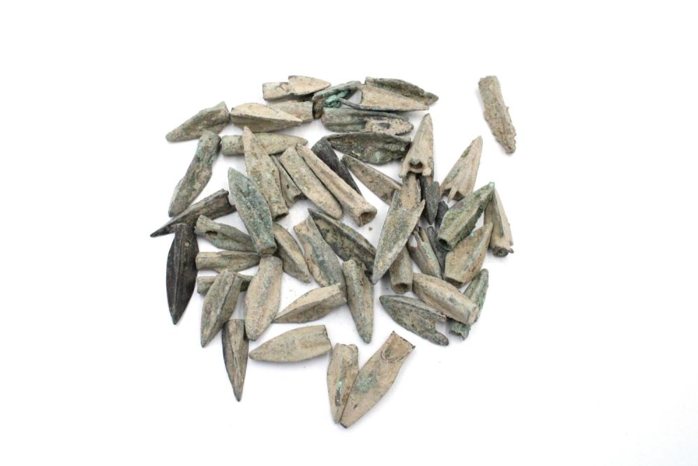 Lot 145: A Lot of 50 Small Bronze Arrow Heads...