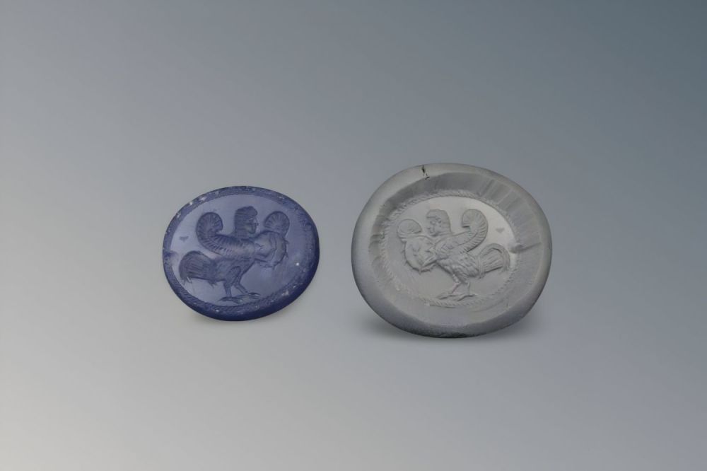 Lot 171: An Eastern Greek Blue Chalcedony Scaraboid from the...
