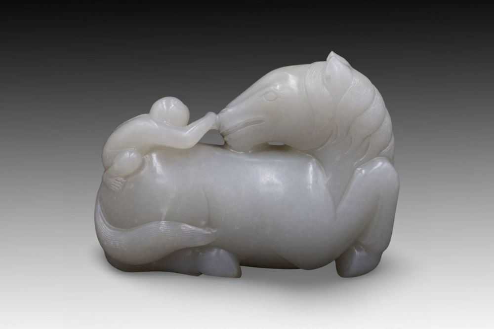 Lot 183: A Chinese Jade Carving of a Horse and...