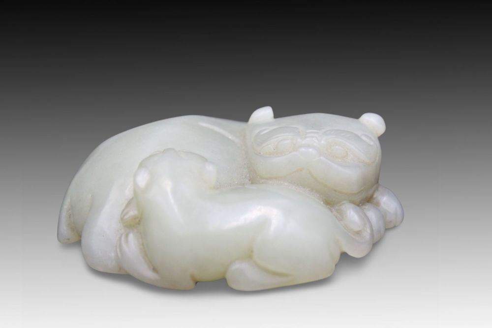 Lot 186: A Chinese Jade Carving of a Mother Cat...