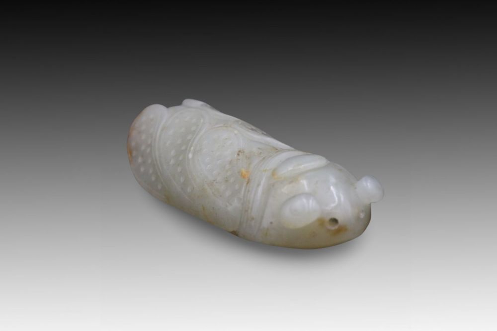 Lot 187: A Chinese Jade Pendant Depicting a Cricket from...