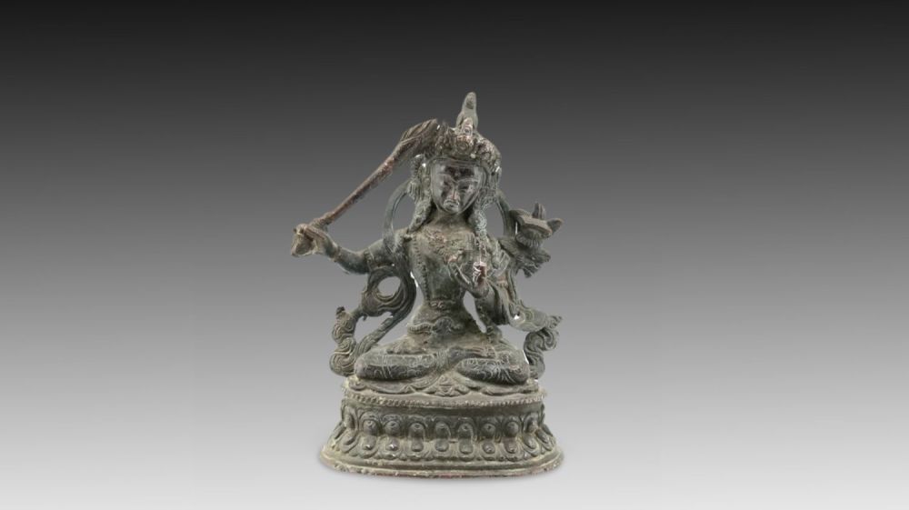 Lot 202: A Chinese Tibetan Bronze Buddhist Statue from the...