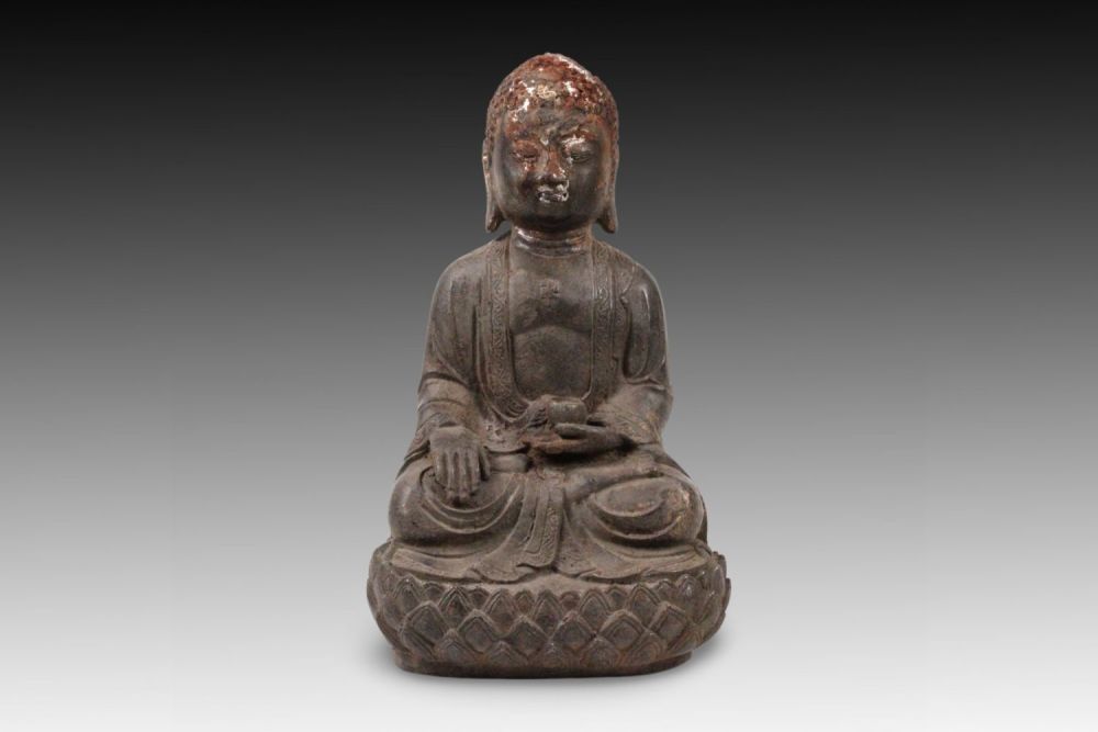 Lot 225: A Chinese Buddhist Statue with Gilt