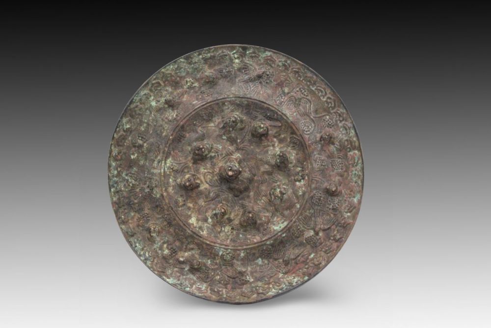 Lot 229: A Chinese Bronze Mirror