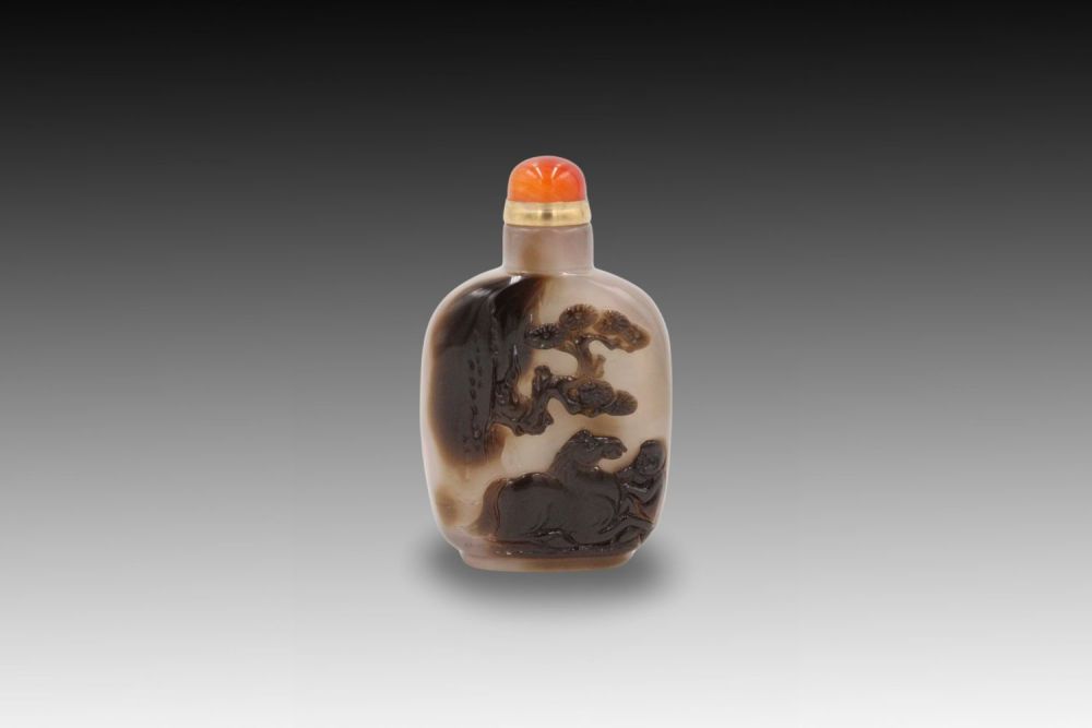 Lot 242: A Chinese Agate Snuff Bottle Depicting a Horse...