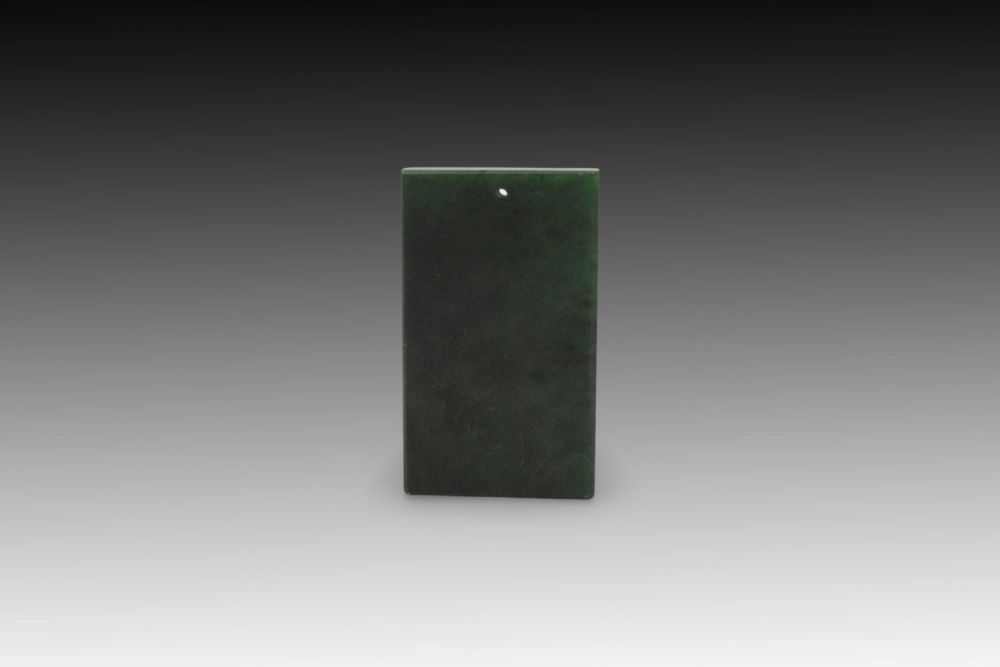 Lot 245: A Chinese Green Jade Pendant