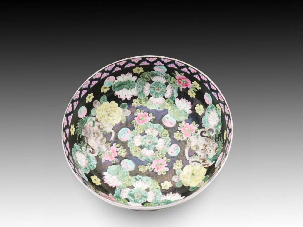 Lot 263: A Japanese Green and Black Bowl from the...