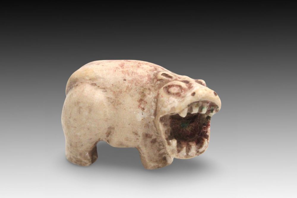 Lot 326: An Egyptian Rare and Exquisite White Faience Hippo...