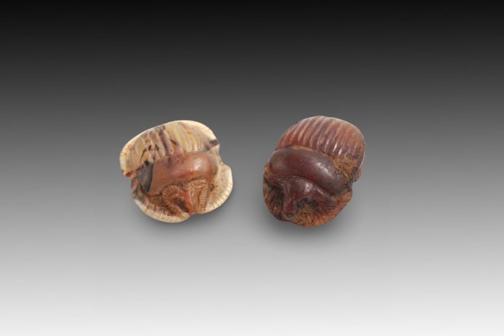 Lot 328: An Egyptian Pair of Carnelian Scarab Insects.