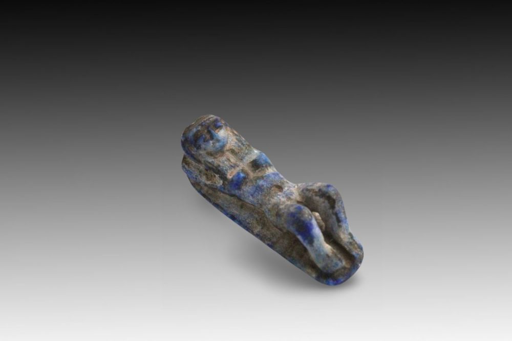 Lot 331: An Egyptian Lapis Lazuli Sculpture of a Reclining...