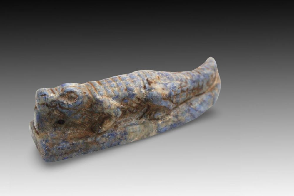 Lot 336: An Egyptian Lapis Lazuli Amulet shaped like a...