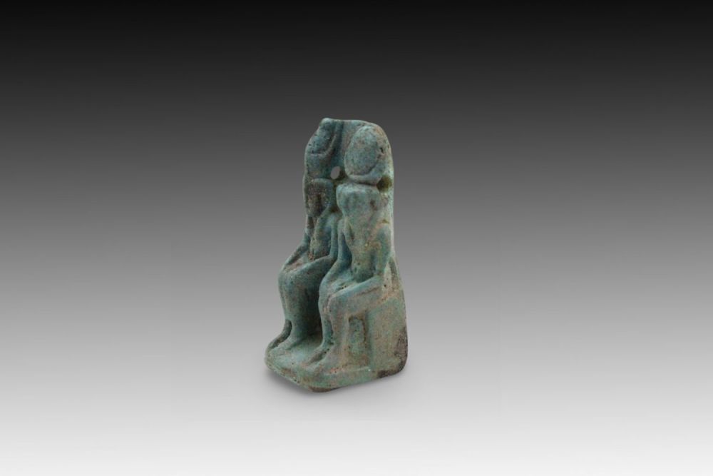 Lot 348: An Egyptian Turquoise Faience Amulet of the Egyptian...