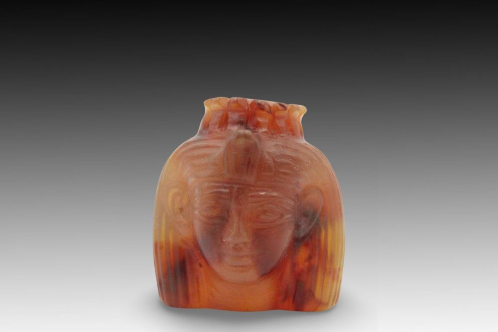 Lot 358: An Egyptian Agate Carnelian Head of Goddess Hathor...