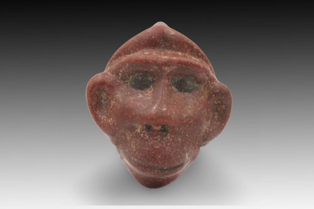 Lot 359: An Ancient Egyptian Cooked Glass Amulet Pendant of...