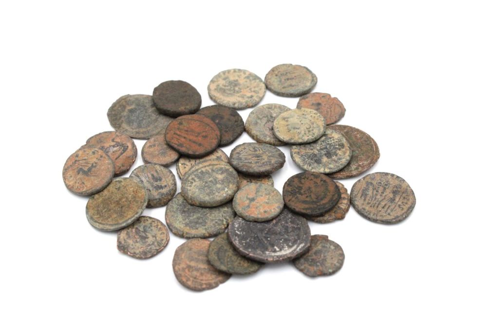 Lot 383: A Lot of 30 Roman Bronze Coins from...