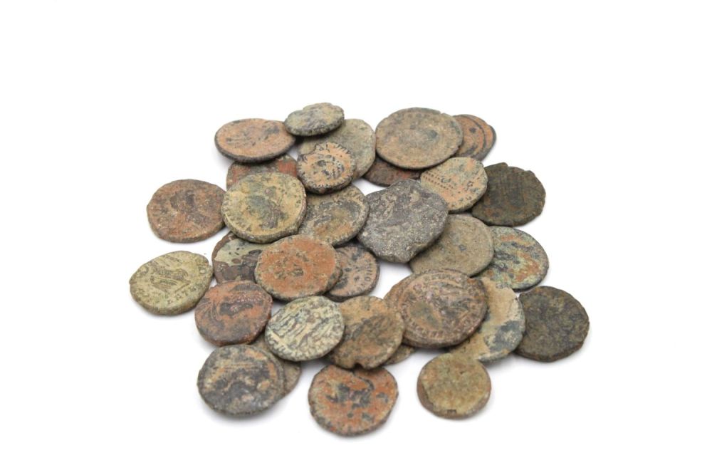 Lot 384: A Lot of 30 Roman Bronze Coins from...