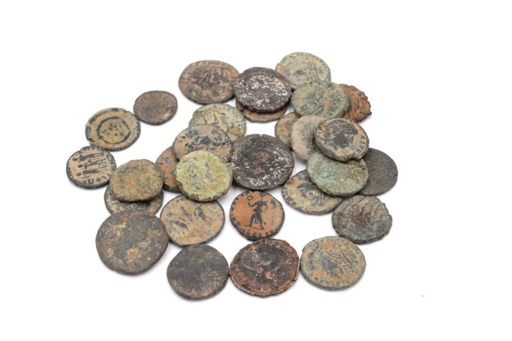 Lot 385: A Lot of 30 Roman Bronze Coins from...