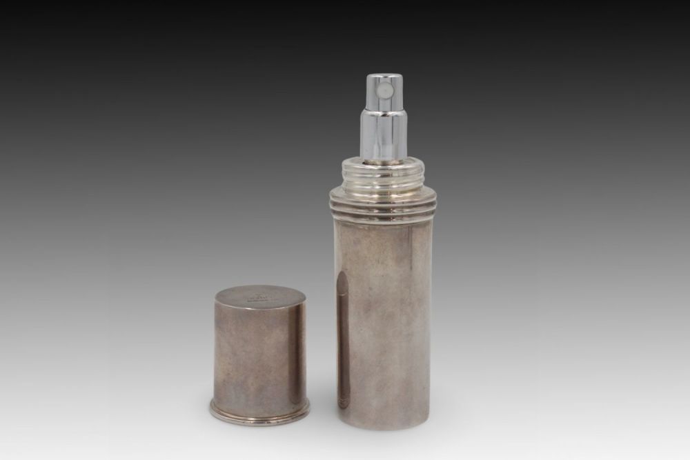Lot 390: A Silver Lot of Perfume Accessories