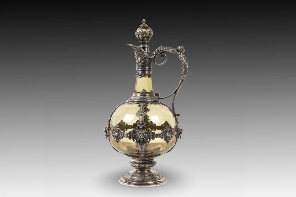 Lot 410: A Silver Plated Jug with a Beautiful Carving...