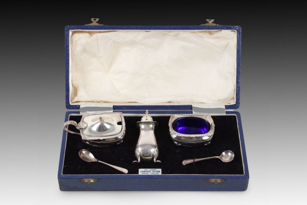 Lot 422: A Birmingham Sterling Silver Condiment Set marked in...