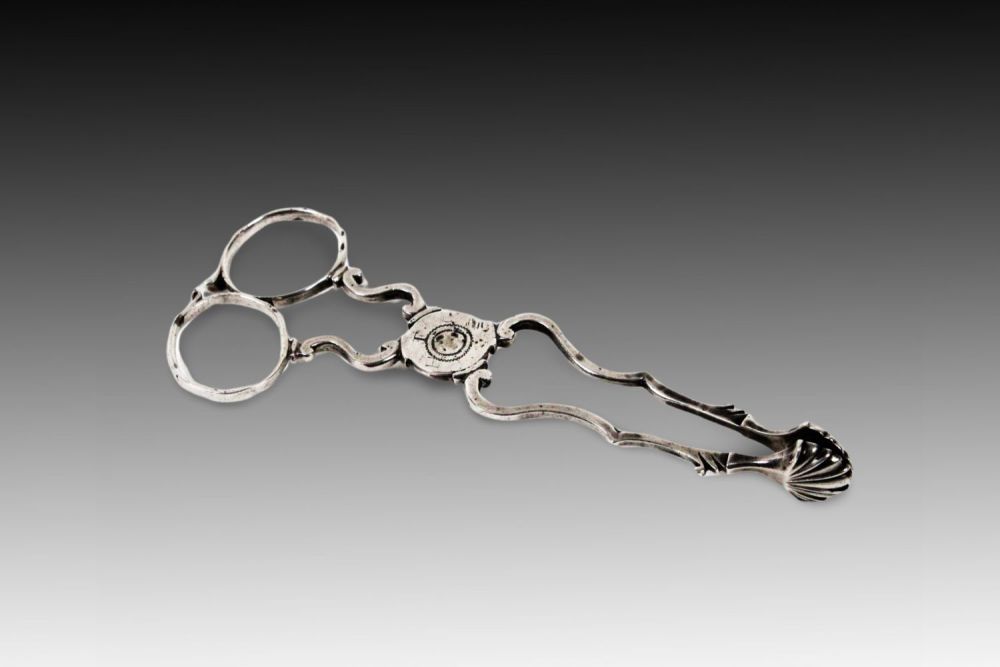 Lot 424: A Steven London Silver Georgian III Sugar Nips...