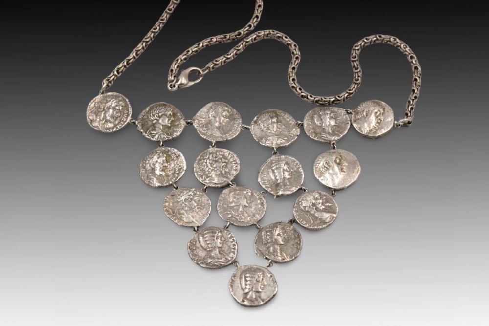 Lot 425: A Roman Silver Coin Necklace consisting of 16...