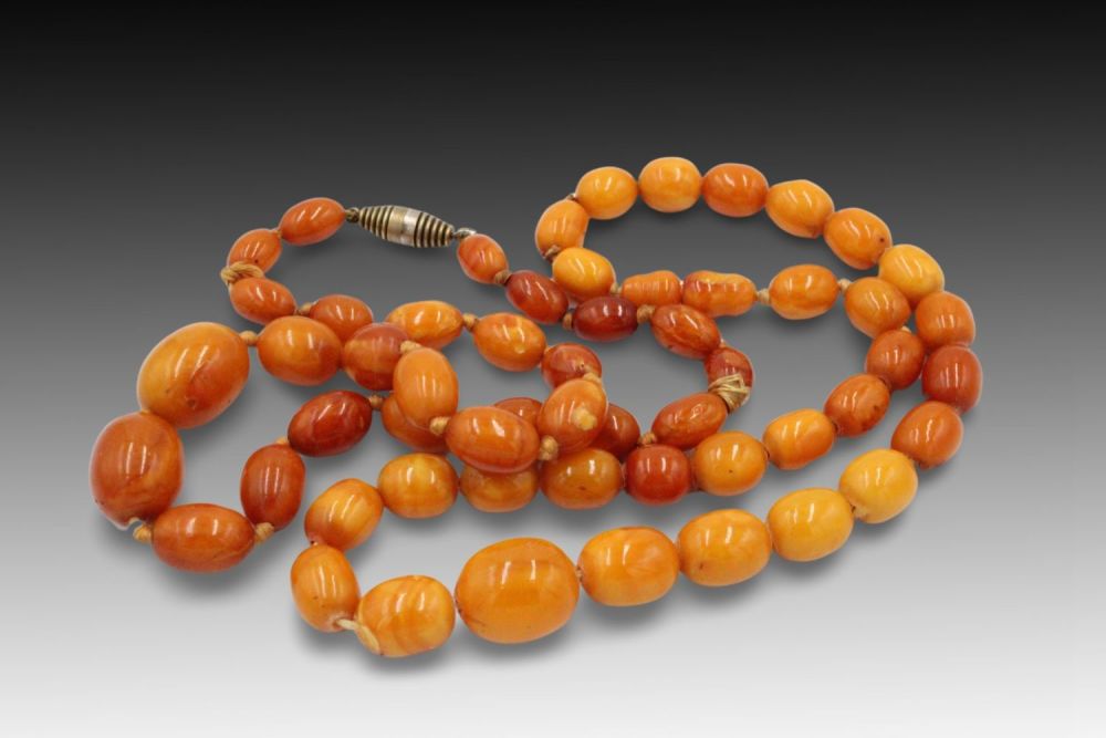 Lot 429: 2 Butterscotch Amber Bead Necklaces.