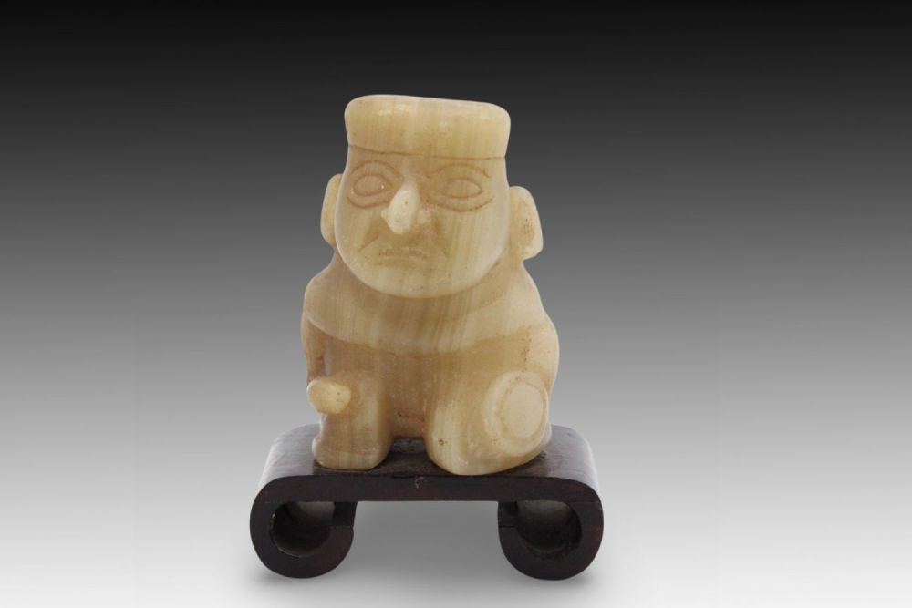 Lot 431: A Figure of an Idol Carved from Alabaster...