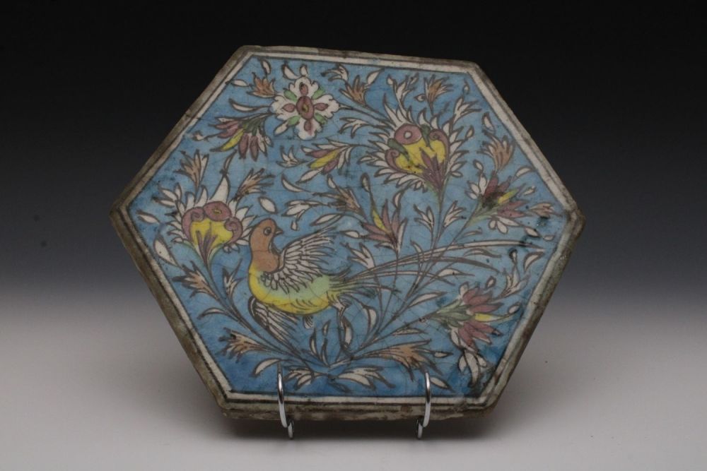 Lot 3: A Persian Hexagonal Formed Tile Decorated with Birds...