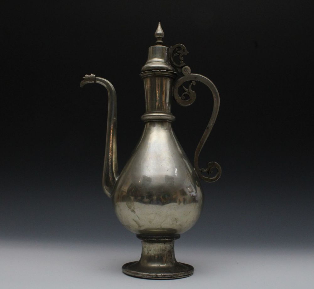 Lot 4: An Islamic Ottoman Copper Silver Polished Ewer Aftaba...
