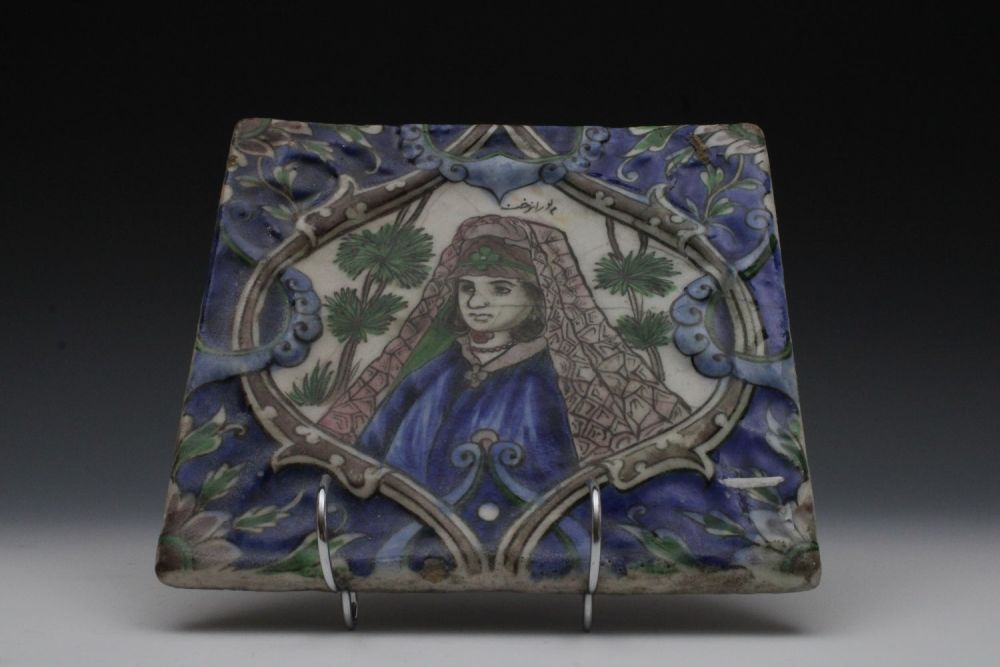 Lot 16: A Qajar Moulded Tile from the 19th Century...