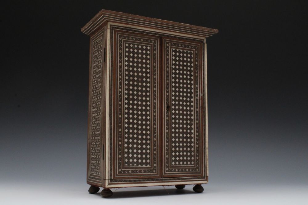 Lot 19: An Iranian Khatam Work Cabinet from the 19th...