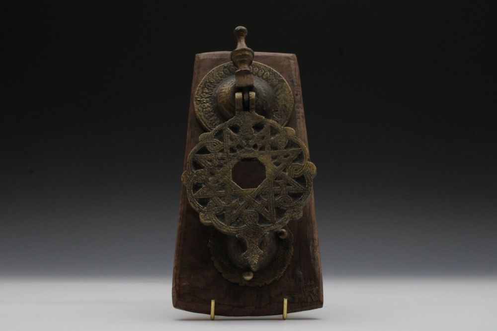 Lot 23: An Islamic Bronze Mamluk Style Door Knocker