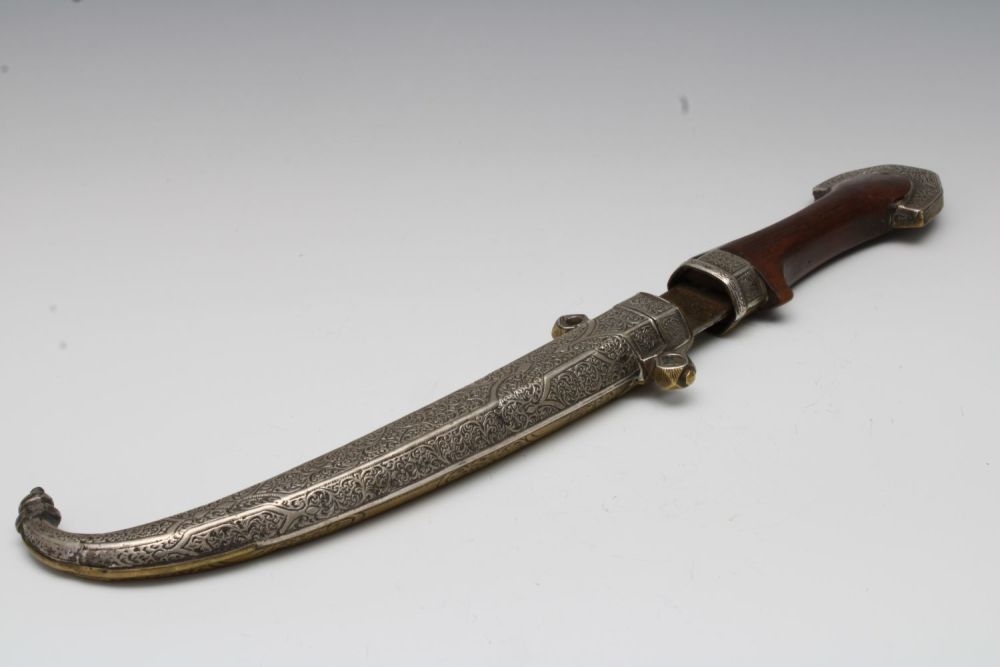 Lot 41: An Islamic Moroccan Silver and Brass Dagger.