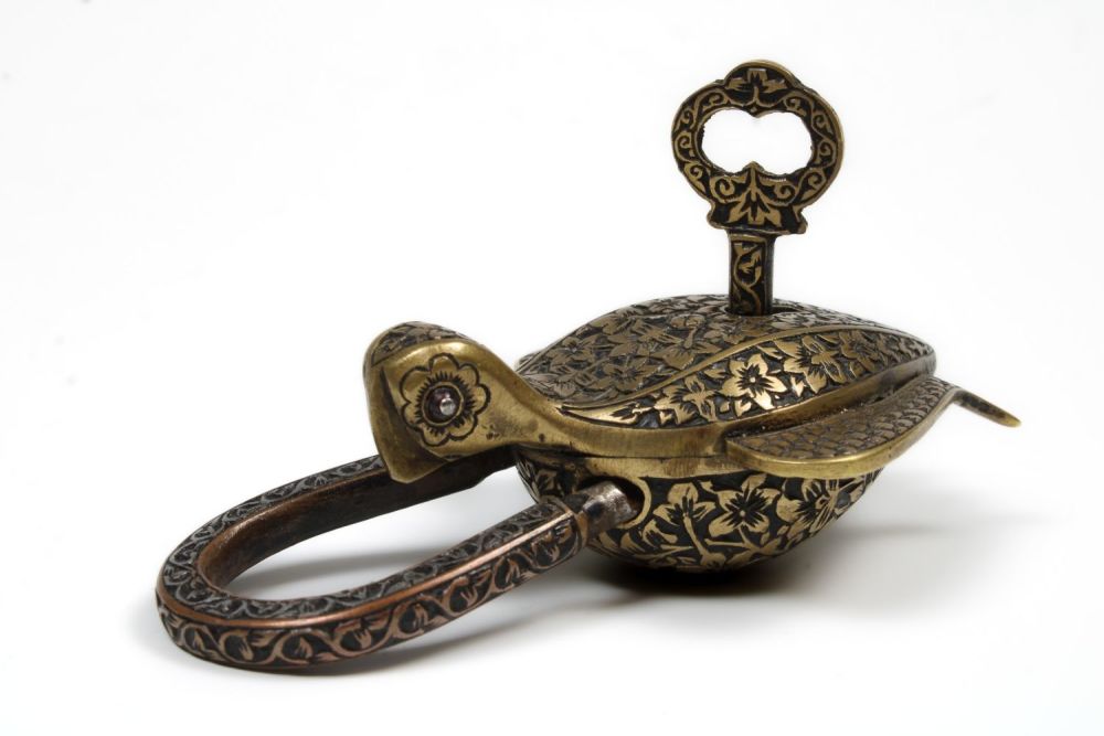 Lot 61: An Islamic Brass Indo-Persian Lock and Key in...